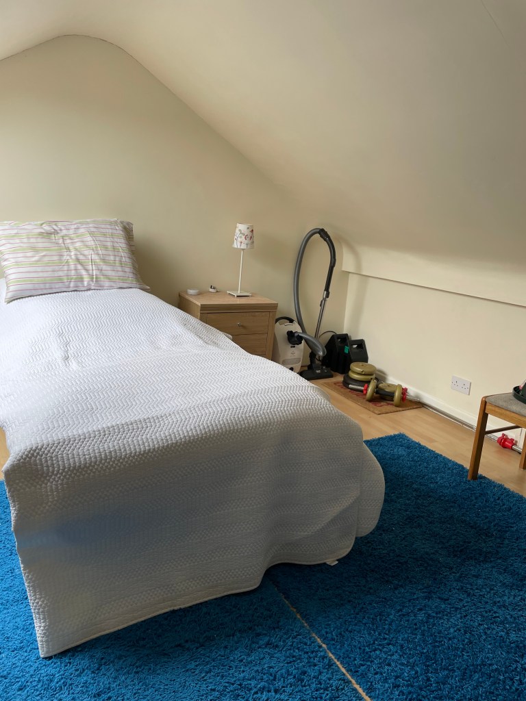 Attic room after clearing process looking tidy and all items accessible